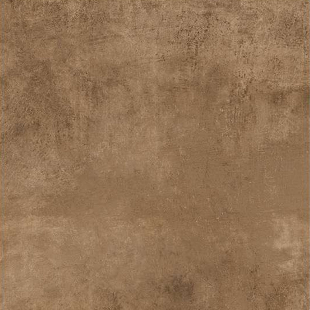 Stableton Copper ceramic floor tile in a 24 x 24 inch square format installed in a modern interior setting, featuring a solid rustic surface with a smooth matt finish, neatly aligned with minimal grout lines to create a spacious and seamless flooring appearance suitable for living rooms, bedrooms, kitchens, and commercial interiors.