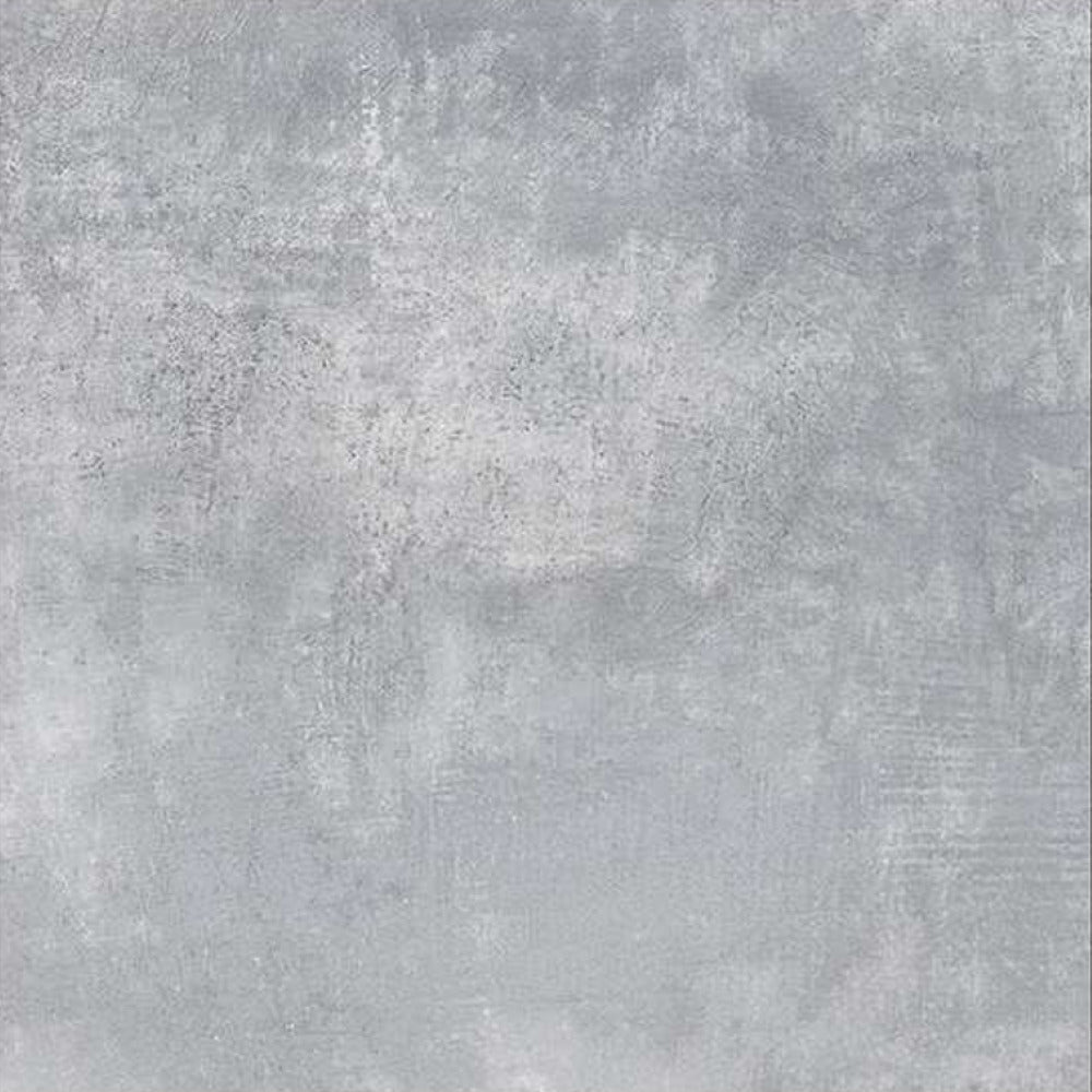 Stableton Gris ceramic floor tile in 24 x 24 inch size featuring a smooth solid surface with subtle rustic texture and matt finish, displayed in a modern interior flooring layout showing uniform edges and seamless installation pattern.