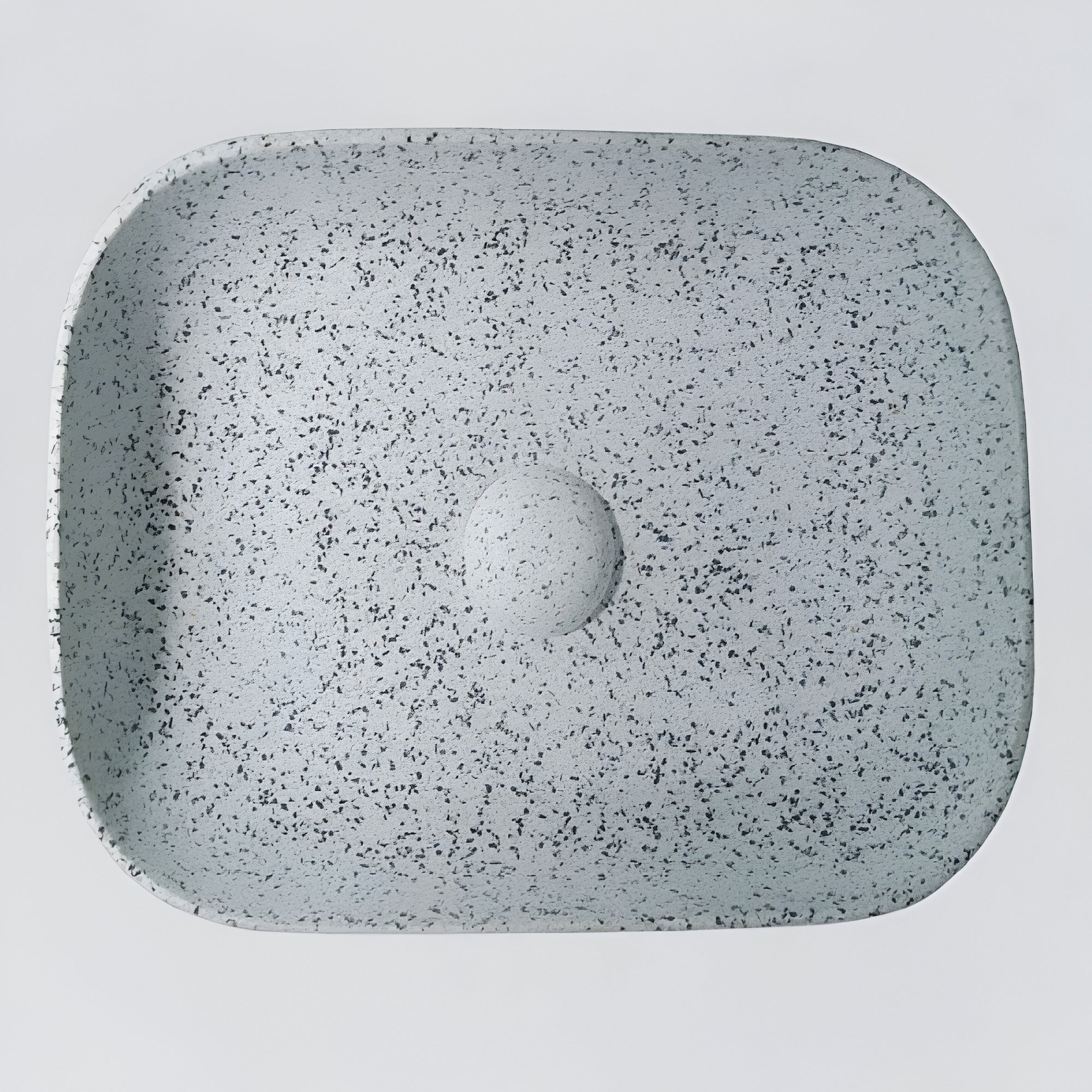 TTH-026-1 terrazzo ceramic countertop washbasin placed on a modern vanity, showcasing its smooth ceramic surface, refined terrazzo pattern detailing, gently curved edges, deep basin structure, and contemporary design suitable for luxury residential and commercial bathroom interiors.