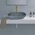 Modern terrazzo design ceramic countertop washbasin TTH-026 placed on a vanity surface, featuring a smooth glazed ceramic body with decorative terrazzo pattern texture, a well-balanced rectangular form, gently curved inner basin, raised countertop installation style, and precision-finished edges, designed for contemporary bathroom interiors with a premium architectural appearance and functional depth.