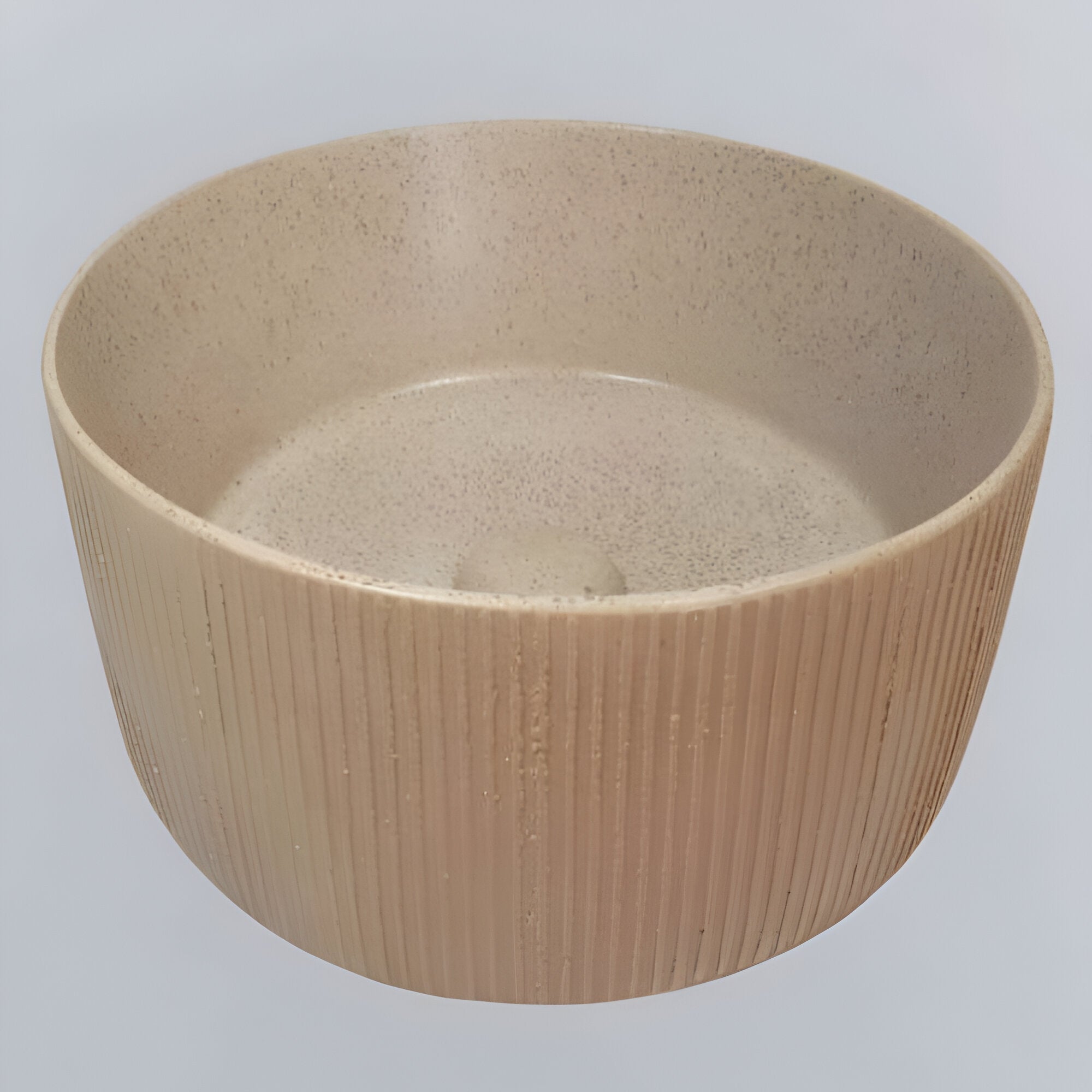 TTH 031 ceramic countertop washbasin displayed on a modern vanity, featuring a square structure with smooth curved edges, Quartz-inspired surface texture, integrated drain area, and a refined design suitable for luxury residential and commercial bathroom interiors.