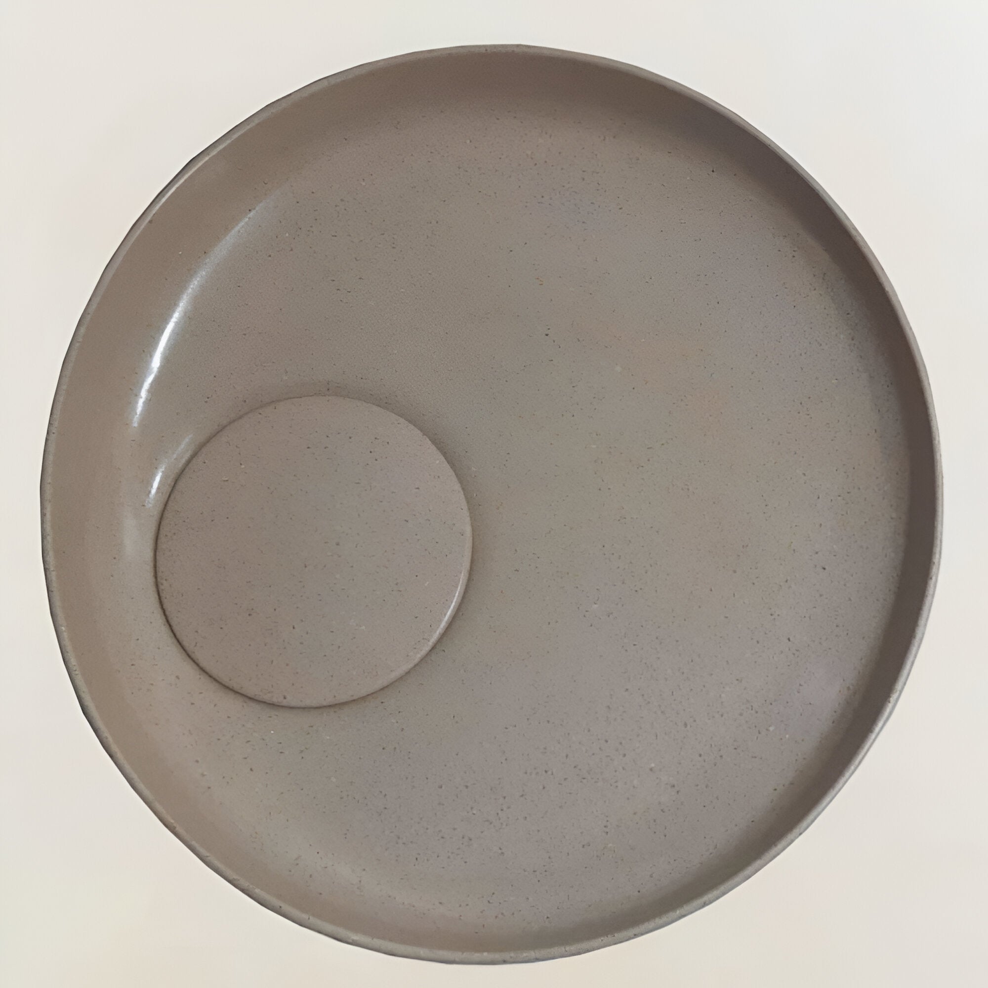 Ceramic countertop washbasin TTH 036 displayed on a modern bathroom vanity, featuring a smooth Quartz-inspired surface texture, compact rectangular form with gently curved edges, precision-crafted basin depth, and a contemporary minimalist design suitable for luxury residential and commercial interiors.