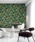 Tahiti 13334 wallpaper design featuring intricate floral patterns in vibrant colors contrasted against a deep black background, showcasing a bold and elegant tropical-inspired interior wall décor.