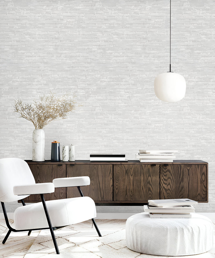 Tahiti 13364 Grey Wallpaper showcasing a sophisticated textured pattern in soft grey, ideal for modern and contemporary interior design.