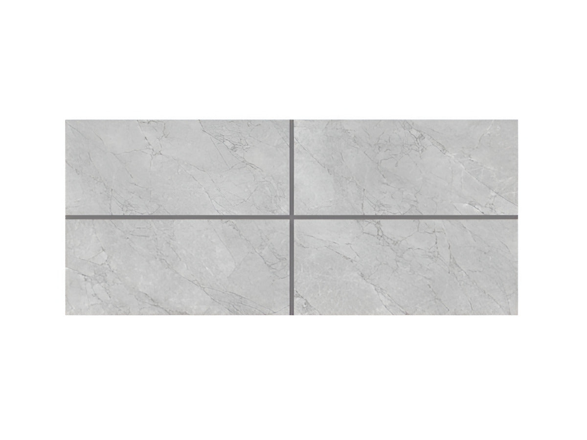 Tamptatino Gris vitrified tile in 24 x 48 inch format featuring a glossy marble-inspired surface pattern, installed on a modern interior floor and wall layout, reflecting light to create a spacious, premium and elegant architectural look with seamless large-format tile alignment.