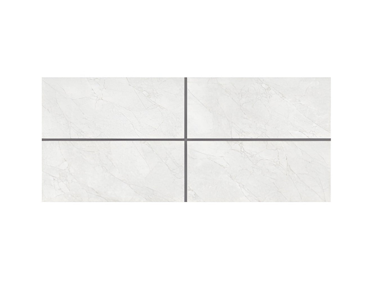 Tamptatino Light marble design vitrified tile in 24x48 inch large format with glossy surface finish, installed on floor and wall showing seamless marble-inspired pattern, modern interior styling, reflective texture, durable vitrified construction, and premium architectural look suitable for residential and commercial spaces.