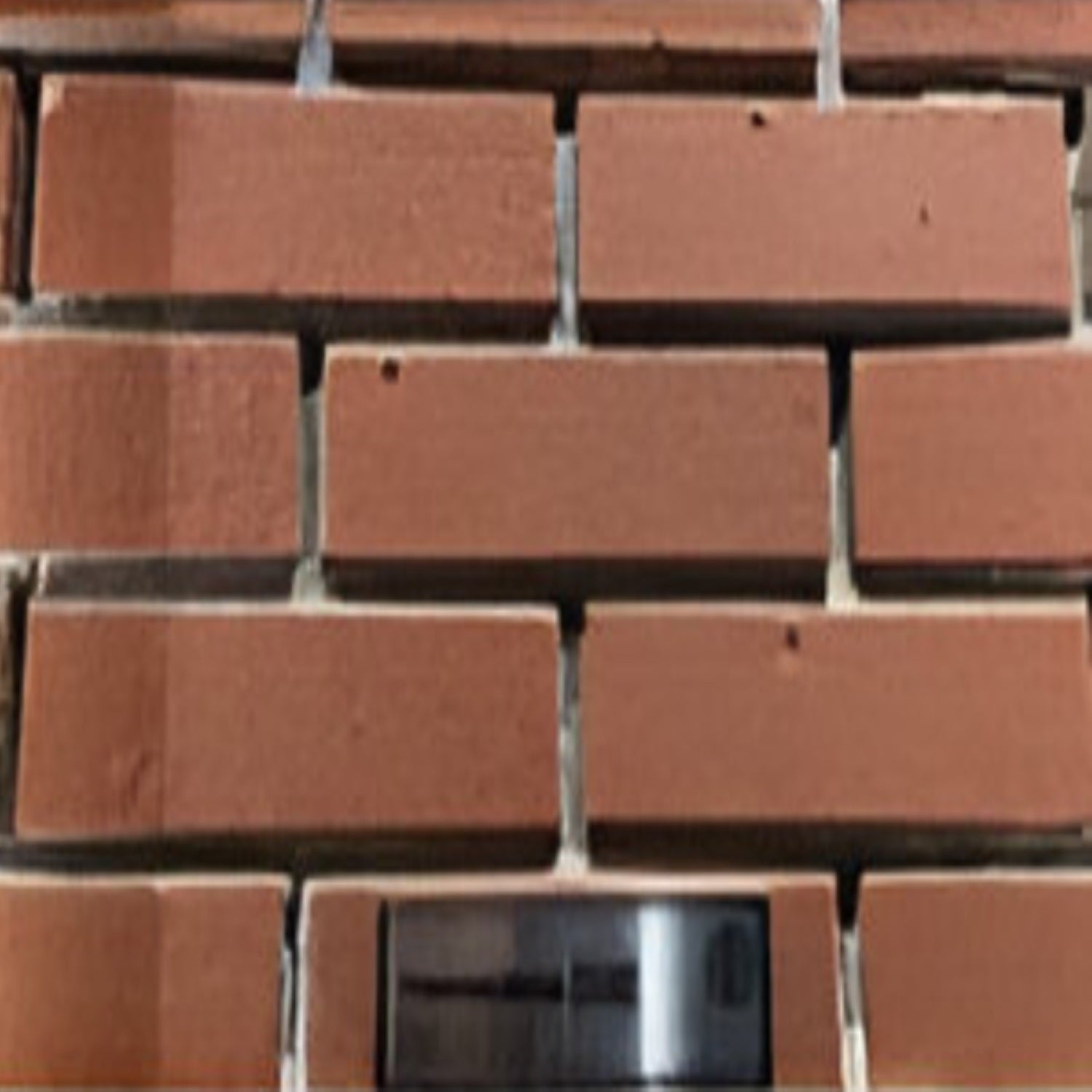 Terracotta SB Clay Brick 1.5x6 Inch, featuring warm earthy tones with a textured surface, ideal for rustic walls and decorative construction elements.
