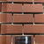 Terracotta SB Clay Brick 1.5x6 Inch, featuring warm earthy tones with a textured surface, ideal for rustic walls and decorative construction elements.
