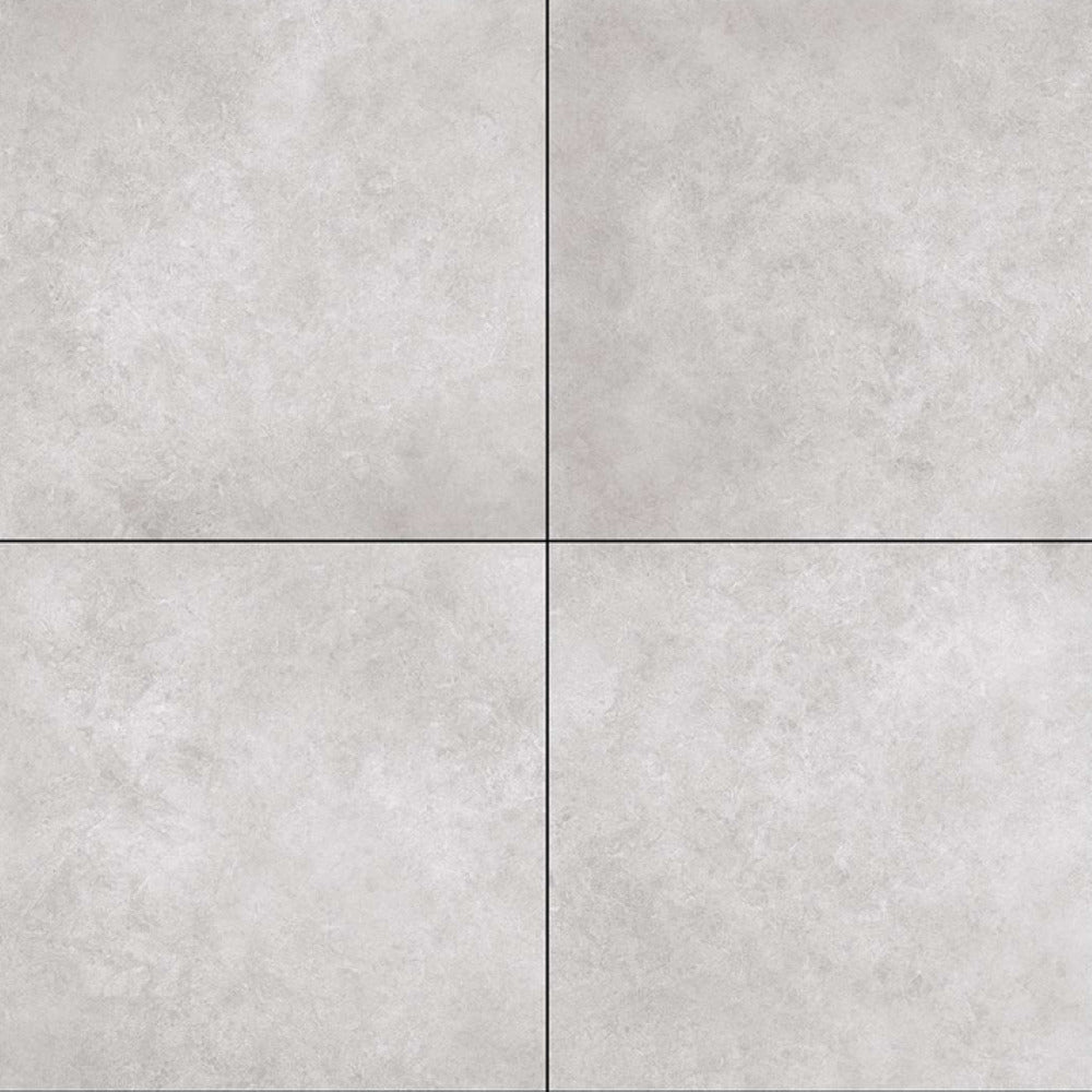 Trans Cemento Ceramic Tile 24 x 24 Inch installed on a modern floor, showcasing a solid rustic surface with matt texture, large square format, seamless joint appearance, and a refined architectural look suitable for contemporary interior flooring designs.