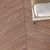 Tropaz Pewter Chevron Wooden Tile 6x36 Inch, featuring soft pewter-toned wood arranged in a chevron pattern, perfect for contemporary and durable flooring or wall applications.

