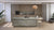 Venera quartz kitchen counter top and table top slab with polished gloss finish installed in a modern interior kitchen setting featuring a smooth engineered quartz surface designed for contemporary countertops, dining tables, kitchen islands, and luxury workspace applications.