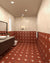 Blossom Terracotta Athangudi tile on bathroom floor and walls up to 4 ft with Urbantek Beige above