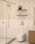 Bathroom with Mould Bone HL-1 beige floral vitrified wall tile above Frame Mould Bone panel tile and bone floor